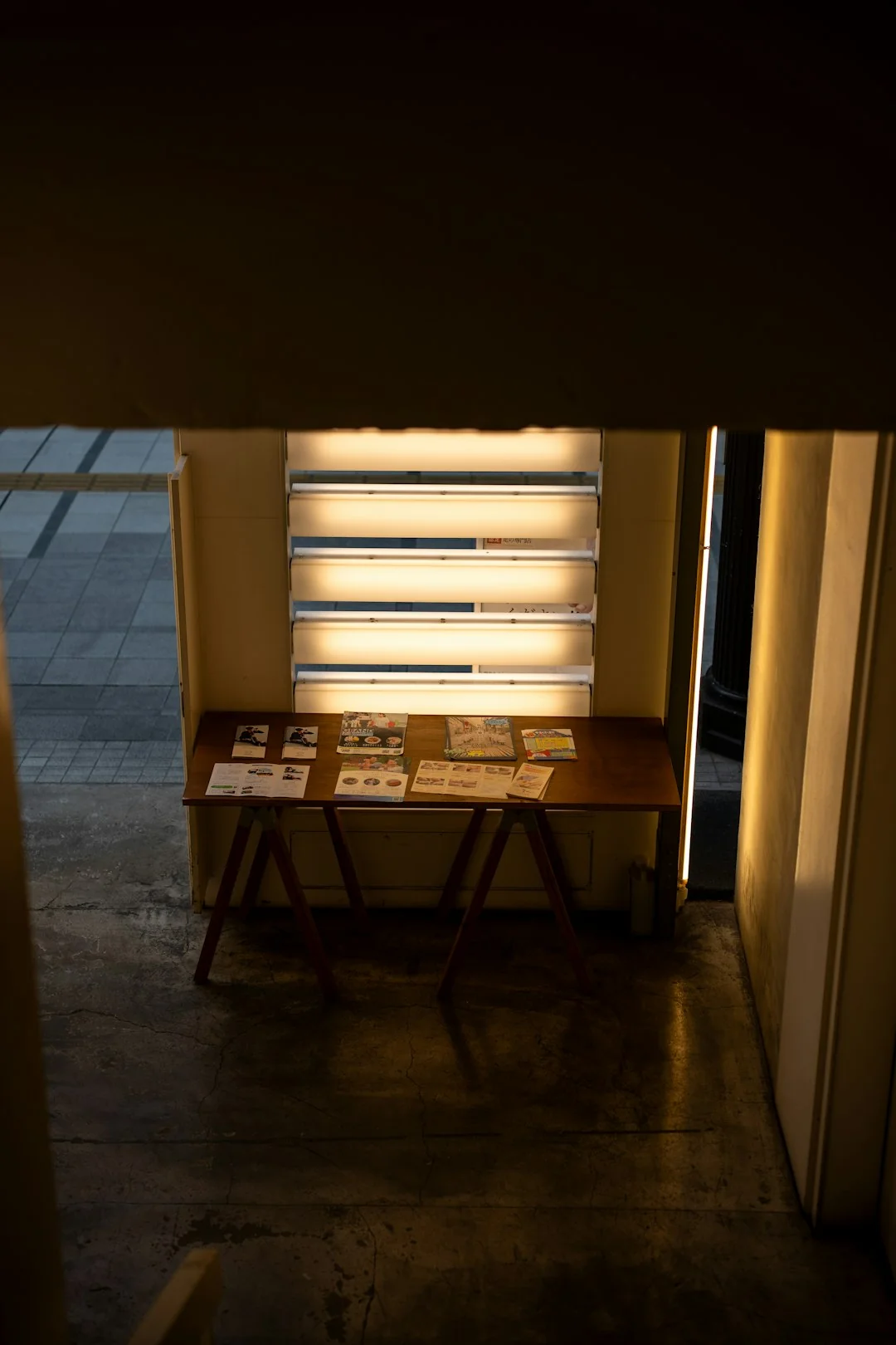 Mobile phone with an e-commerce interface on a wooden surface, illustrating online shopping technology.
